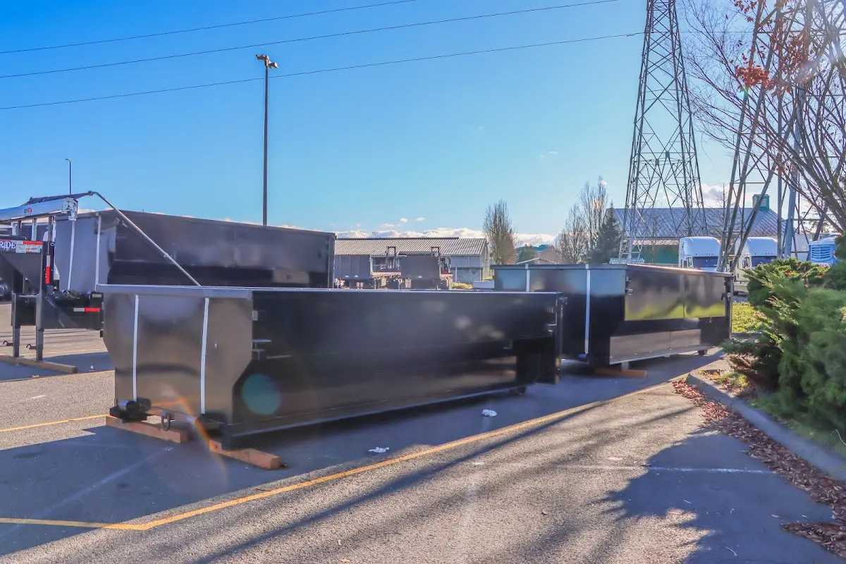 Roll-off dumpster ready for waste disposal at job site for 15 Yard Dumpster Rental in Calumet